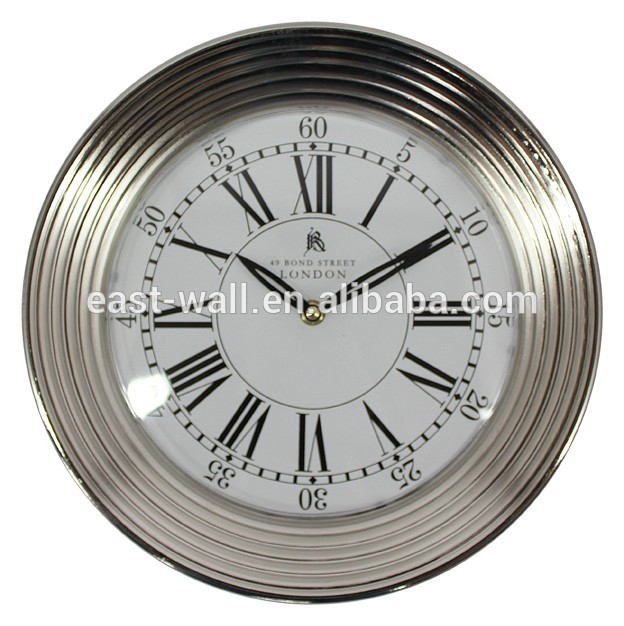 a wall clock electroplating clock silver imitated round skeleton