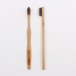 Cepillo de dientes de bambú con mango plano y forma de onda