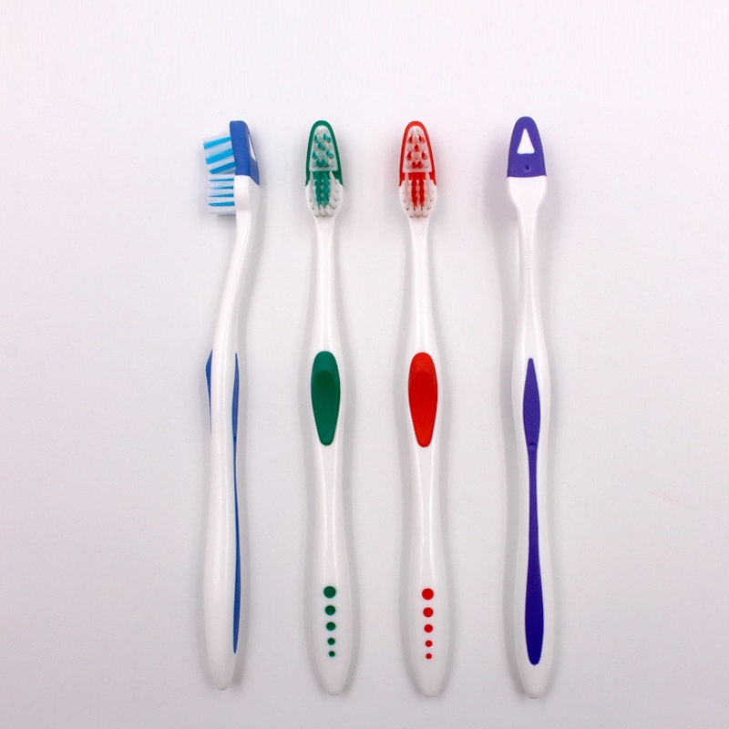 Cepillo de dientes adulto con cabeza ondulada