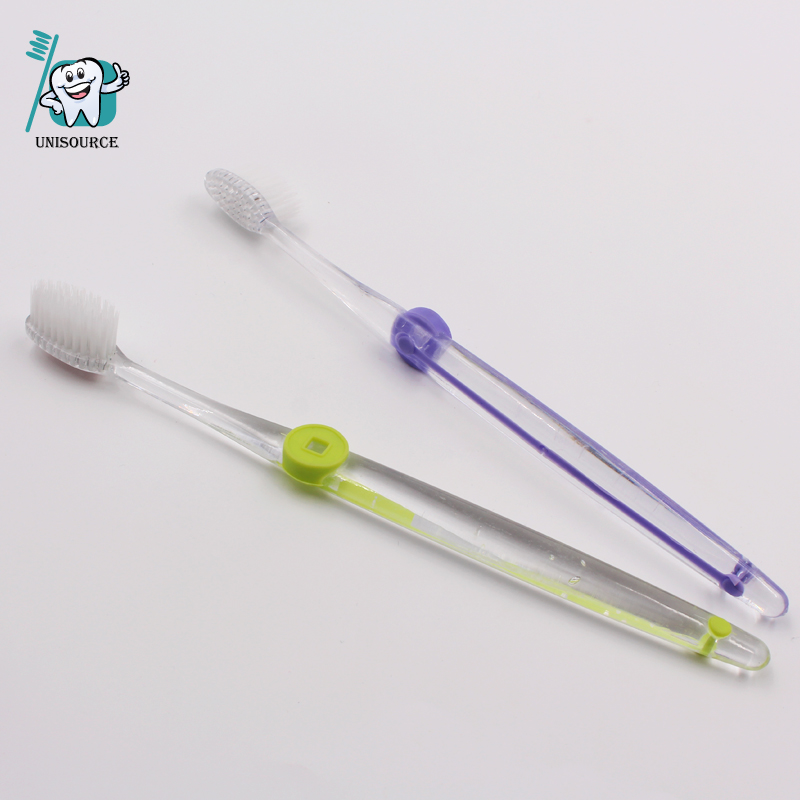 Cepillo de dientes adulto con mango PE transparente