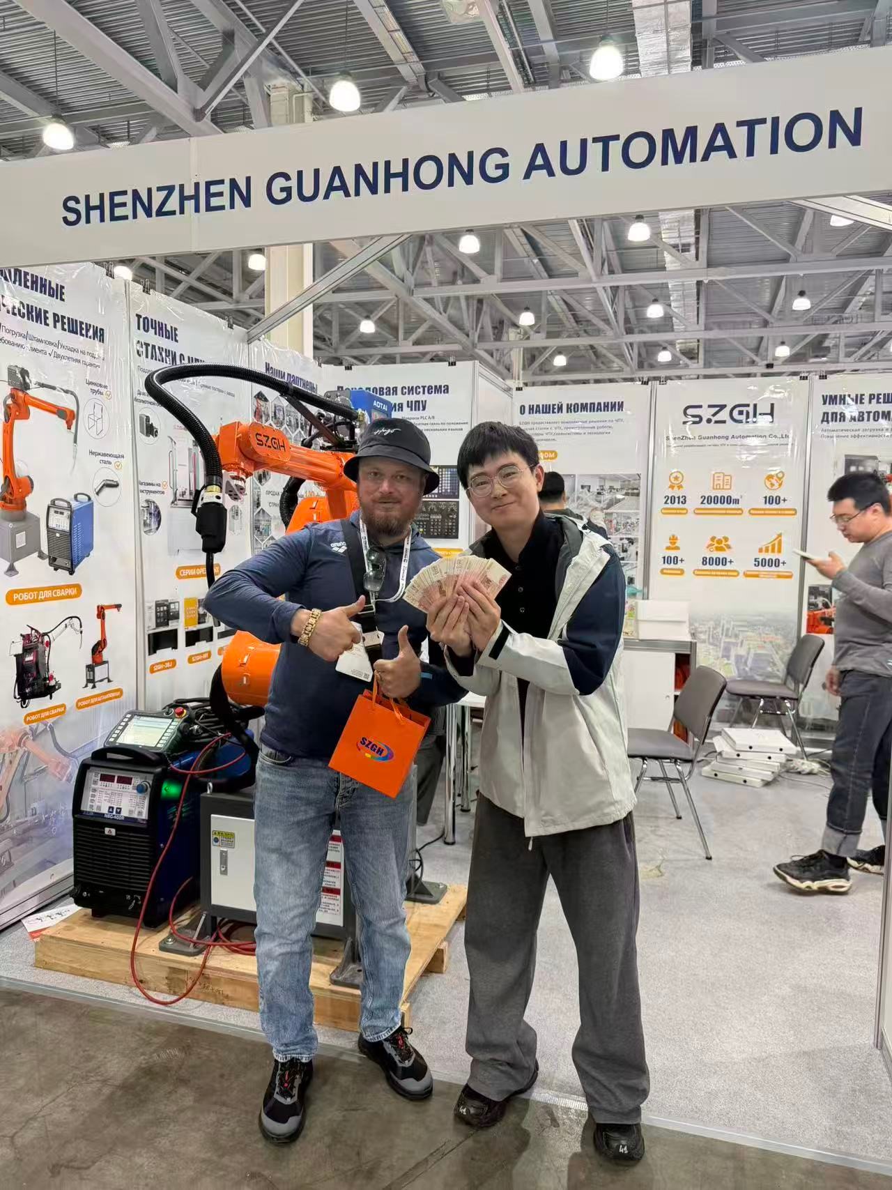 SZGH(Shenzhen Guanhong Automation) 전시 부스 — 러시아 고객이 SZGH robots.jpg를 처음 접한 곳